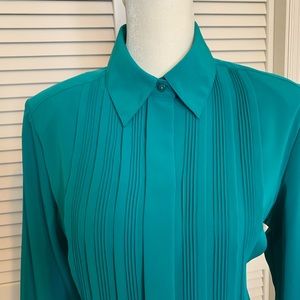 Green long sleeve top.